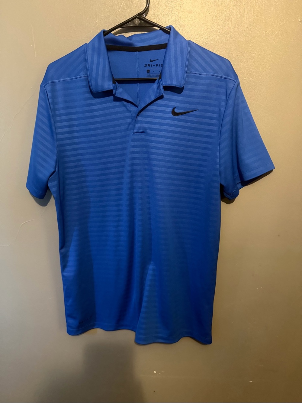 Nike Men’s Royal Blue Short Sleeve Polo with Black Swoosh
